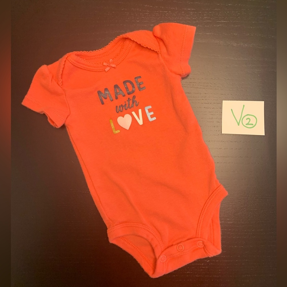 ⭐️5/$10.00⭐️— Carter's ‘Made with Love' Baby Onesie (NB)